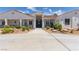 Inviting single-story home with well-maintained landscaping and a long driveway at 60 N Fogg St, Las Vegas, NV 89110