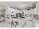 Modern kitchen featuring custom cabinetry, a stylish island and high-end appliances for a chef's delight at 60 N Fogg St, Las Vegas, NV 89110