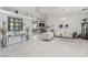 Spacious living room featuring tile floors, bright interiors and contemporary decor, perfect for modern living at 60 N Fogg St, Las Vegas, NV 89110