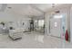 Bright living room featuring tile floors, modern decor and contemporary furnishings for a stylish living experience at 60 N Fogg St, Las Vegas, NV 89110