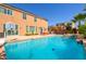 Backyard featuring a private pool and outdoor dining and lounging areas perfect for entertaining and relaxation at 6403 Brandon Hills Ct, Las Vegas, NV 89139