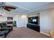 Bonus room with large TV, gaming chairs, kitchenette and desk at 6403 Brandon Hills Ct, Las Vegas, NV 89139