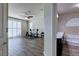 Home gym connected to bathroom with a soaking tub and vanity at 6403 Brandon Hills Ct, Las Vegas, NV 89139