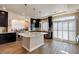 Beautiful kitchen with stainless steel appliances, ample counter space and white shutters at 6403 Brandon Hills Ct, Las Vegas, NV 89139