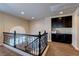 Loft area with custom built-ins and view of lower level at 6403 Brandon Hills Ct, Las Vegas, NV 89139