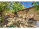 Private backyard with a fire pit and space for outdoor seating and relaxation at 6437 Boatbill St, North Las Vegas, NV 89084