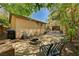 Relaxing backyard space with a fire pit, chairs, and cozy seating arrangement at 6437 Boatbill St, North Las Vegas, NV 89084