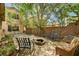 Outdoor living space boasting a fire pit, seating, and well-manicured landscaping at 6437 Boatbill St, North Las Vegas, NV 89084