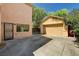 Spacious backyard with a large patio and a detached two car garage at 6437 Boatbill St, North Las Vegas, NV 89084