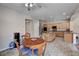 Bright eat-in kitchen with center island and plenty of cabinet space for storage at 6437 Boatbill St, North Las Vegas, NV 89084