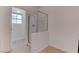 Bathroom with a tile floor, glass door shower, and white walls at 6624 Old Oxford Ave, Las Vegas, NV 89108