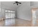 Bright bedroom with ceiling fan and glass doors to a patio at 6624 Old Oxford Ave, Las Vegas, NV 89108