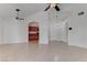 Open-concept living room with tile flooring throughout at 6624 Old Oxford Ave, Las Vegas, NV 89108