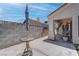 Patio with an umbrella stand, view of block wall, and entrance to home at 6624 Old Oxford Ave, Las Vegas, NV 89108