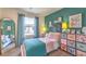 Cozy bedroom featuring a charming decor, bright colors, and a comfortable bed at 6926 Wrightshire St # 20, Las Vegas, NV 89166