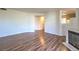 Spacious living room area features hardwood floors and ample natural light at 698 S Racetrack Rd # 1014, Henderson, NV 89015