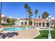 Resort-style pool and spa area with palm trees and lounge seating, perfect for relaxation and community gatherings at 698 S Racetrack Rd # 1014, Henderson, NV 89015