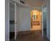 Hallway with entrances to bathroom and closet, with carpeted floor at 698 S Racetrack Rd # 1411, Henderson, NV 89015