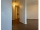 Hallway boasting modern wood-look flooring and access to multiple rooms at 698 S Racetrack Rd # 1411, Henderson, NV 89015