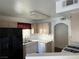 Efficient kitchen with linoleum countertops, ample cabinetry, and essential appliances at 698 S Racetrack Rd # 1411, Henderson, NV 89015