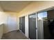Exterior patio with sliding glass doors, a white painted storage closet, and stucco siding at 698 S Racetrack Rd # 1411, Henderson, NV 89015