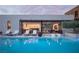 Luxury home with a pool and seamless indoor-outdoor living at 7030 Schirlls St, Las Vegas, NV 89118