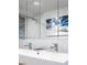 Modern bathroom featuring a double sink vanity and stylish mirror cabinets at 7030 Schirlls St, Las Vegas, NV 89118