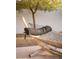Comfortable hammock nestled in a serene setting, perfect for relaxation and outdoor living at 7030 Schirlls St, Las Vegas, NV 89118