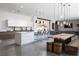 Modern kitchen with a large island and stainless steel appliances at 7030 Schirlls St, Las Vegas, NV 89118