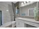 Bathroom featuring marble walls, modern finishes, and a vanity area at 708 Kibbey St, Las Vegas, NV 89178