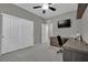 Bedroom with a work space, ceiling fan, and closet at 708 Kibbey St, Las Vegas, NV 89178