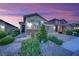 Charming single-Gathering home with desert landscaping and a welcoming entrance at 708 Kibbey St, Las Vegas, NV 89178