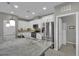 Modern kitchen with stainless steel appliances, granite countertops, and ample storage at 708 Kibbey St, Las Vegas, NV 89178