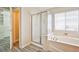 The bathroom boasts double sinks, soaking tub, and stand up shower at 7083 Somera Way, Las Vegas, NV 89113