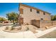 The side of a home featuring a neutral color palette, and rock landscaping at 7083 Somera Way, Las Vegas, NV 89113