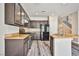 Kitchen with stainless steel appliances, granite counters, and plenty of cabinet space at 7083 Somera Way, Las Vegas, NV 89113