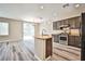 Kitchen featuring granite countertops, stainless steel appliances, and island at 7083 Somera Way, Las Vegas, NV 89113