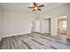 This spacious main bedroom boasts lots of natural light, ceiling fan, and access to the bathroom at 7083 Somera Way, Las Vegas, NV 89113