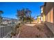 Backyard featuring easy-care desert landscaping; covered patio at 722 Descartes Ave, Henderson, NV 89002