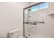 Contemporary bathroom featuring a glass-enclosed shower with a sleek design and efficient use of space at 722 Descartes Ave, Henderson, NV 89002