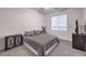 Comfortable bedroom featuring neutral colors, plush carpeting, and a full size bed at 722 Descartes Ave, Henderson, NV 89002