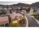 A charming two-story home situated on a corner lot in a desert neighborhood with mountain views at 722 Descartes Ave, Henderson, NV 89002