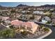 A charming two-story home situated on a corner lot in a desert neighborhood with mountain views at 722 Descartes Ave, Henderson, NV 89002