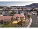 A charming two-story home situated on a corner lot in a desert neighborhood with mountain views at 722 Descartes Ave, Henderson, NV 89002