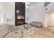 Bright and airy living room features a fireplace, entertainment center, and a high ceiling at 722 Descartes Ave, Henderson, NV 89002