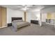 Large main bedroom with ceiling fan, closet, and doorway to another room at 722 Descartes Ave, Henderson, NV 89002
