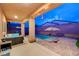 Inviting covered patio with ample seating, adjacent to a refreshing pool in a private backyard at 7235 Summer Air Ave, Las Vegas, NV 89179