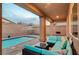 Inviting backyard patio with refreshing pool and cozy outdoor seating area, perfect for relaxation and entertaining at 7235 Summer Air Ave, Las Vegas, NV 89179