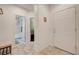 Hallway entrance with bathroom and front door views at 7235 Summer Air Ave, Las Vegas, NV 89179
