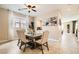 Bright dining area features stylish table, chairs, and modern decor at 7424 Rainford St, Las Vegas, NV 89148